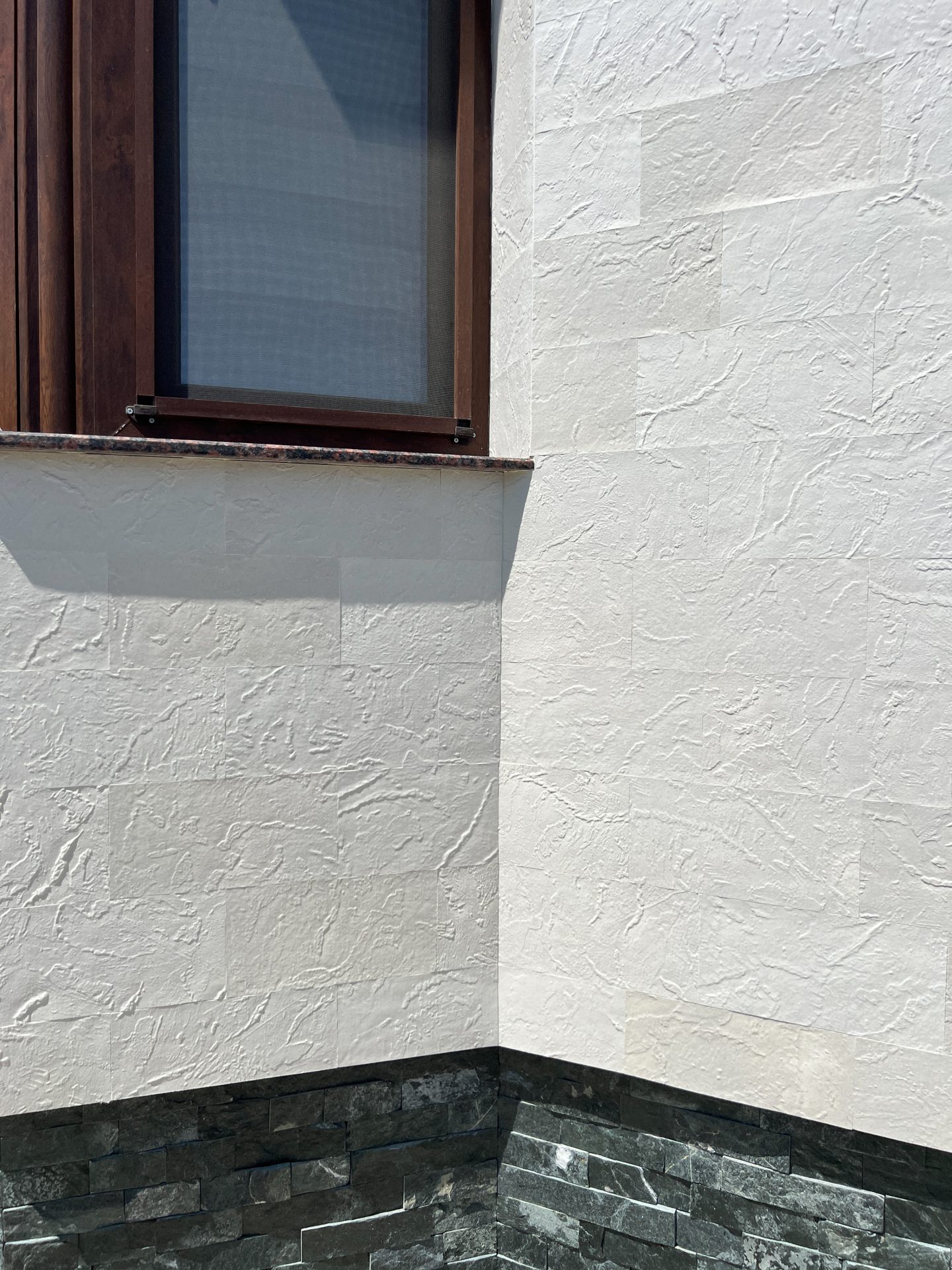 Flexible stone — the extended facade of a complex — 22